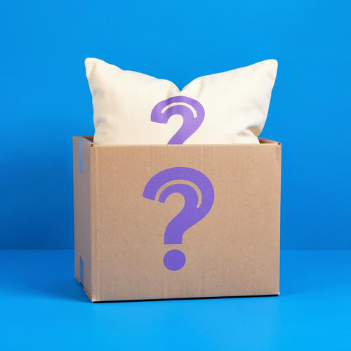 Mystery Puff surprise pillow box with a hidden Ugly Puffs photo pillow inside