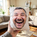 Human face photo pillow held up in a living room, printed from a customer photo